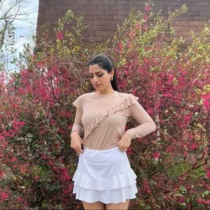 Pink long sleeve with ruffle crossbody detailing